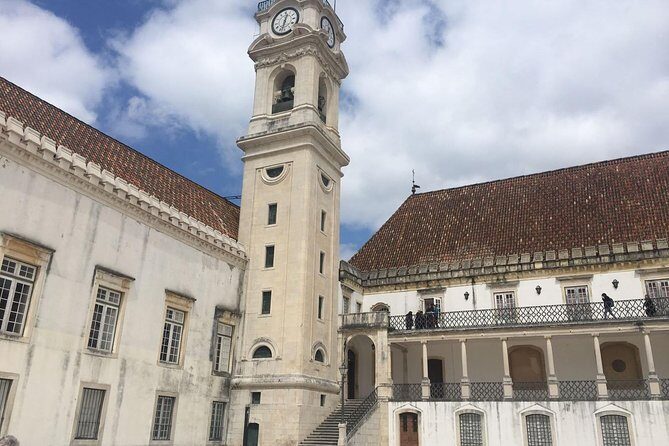 Aveiro and Coimbra Small Group Tour with Moliceiro Boat Cruise - Aveiro on Land: Station Stop, Lunch Time, and Costa Nova Quick Hit