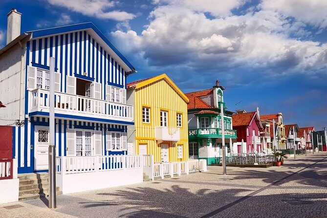 Aveiro and Costa Nova: Private Tour with Moliceiro Cruise Half Day - Aveiro city time: canals, Roman-era roots, and Ovos Moles