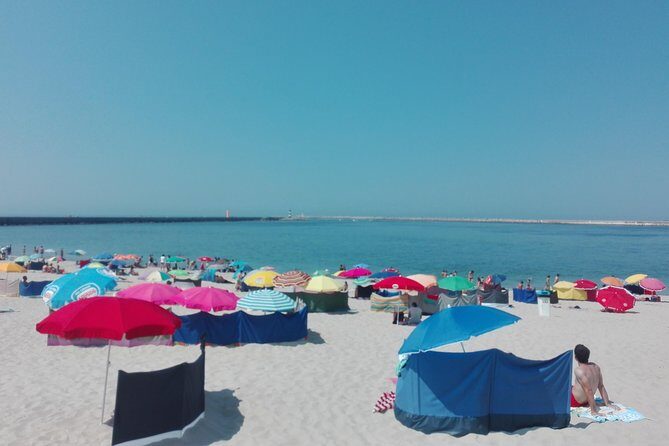 Aveiro, Costa Nova beach and Moliceiro Boat, half-day from Coimbra - Costa Nova: striped houses and a taste of the shoreline