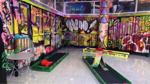 Porto: 18-Hole Indoor Mini Golf Ticket with UV Light Courses - Your 18 holes: how the natural light course changes the feel