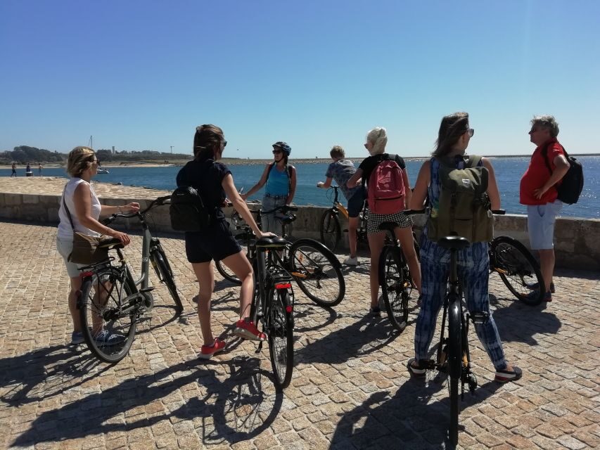 Porto: City Highlights 3-Hour Guided Electric Bike Tour - Lello Bookstore and Clérigos Tower: iconic exteriors, smart timing