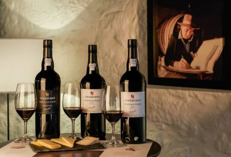 Porto: Cockburn’s Port Lodge Tour and Tasting - Inside the granite cellars: barrels, vats, and coopers