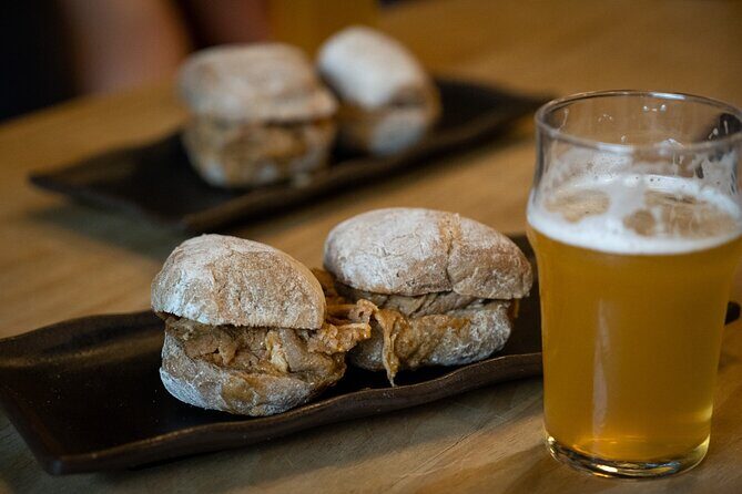 Porto Craft Beer Tour: 7 Beers + 3 Food Pairings in a Small Group - Stop 1: Armazém da Cerveja, Porto’s Beer Warehouse Warm-Up