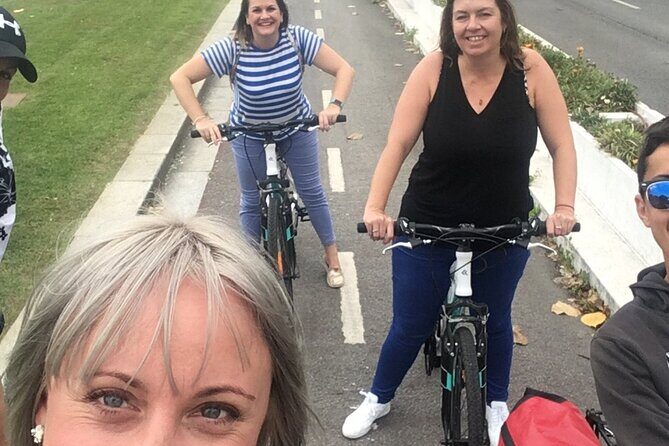 Porto Downtown and Sightseeing Bike Tour - A Beach-Linked City Park With Lakes and Birds