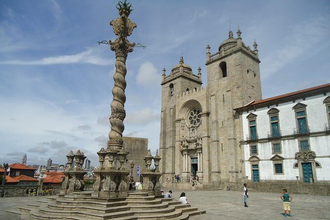 Porto Full Day City Tour Wine Tasting and Six Bridges Cruise - Clérigos Church Area: Baroque Architecture Without the Ticket Pressure