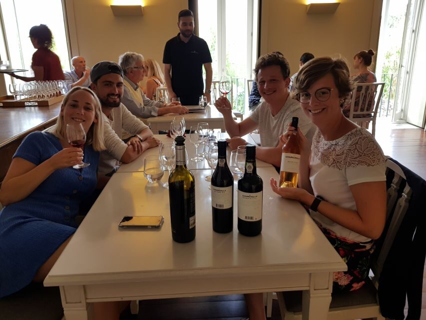 Porto: Port and Douro Wine Walking Tour with 9 Tastings - Guides, group vibe, and pacing in three hours of wine