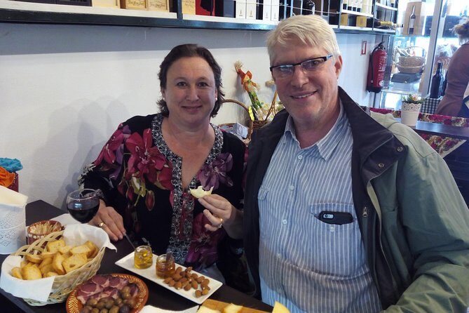Porto Private Food & Wine Walking Tour with Market & Tastings - Mercado do Bolhão: local snacking with green wine and preserved fish