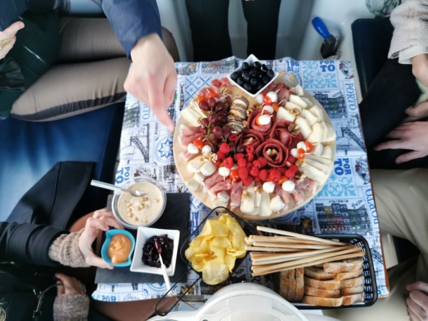 Porto: Private Sailboat Trip with Wine Tasting & Charcuterie - Sailing toward the sea: the river views get quieter, the flavors get louder