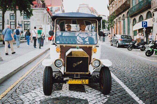 Porto: Private Tour to the Historic Center in a Classic Car - Crossing Luís I Bridge for river views that look like postcards