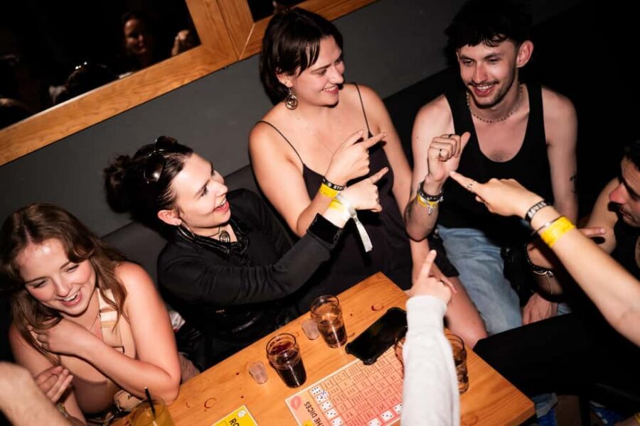 Porto: Pub Crawl with 7 Drinks, Games, and VIP Club Entry - Drinking Games: The Social Glue for Solo Travelers
