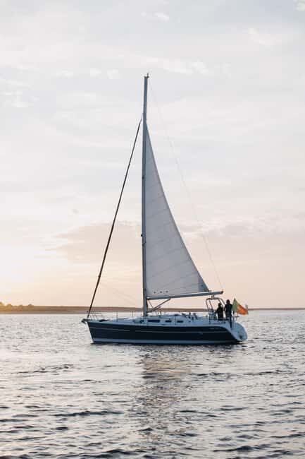 Porto: Shared Douro River Sunset Cruise with Welcome Drink - Your ride: the SailBoat Calitor (and where to sit)