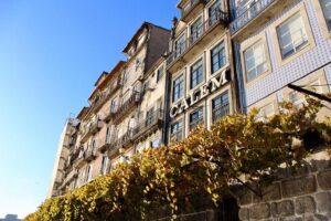 Porto Small Group Walking Tour with Lello Bookshop - São Bento Train Station tiles: the stop that makes history feel real