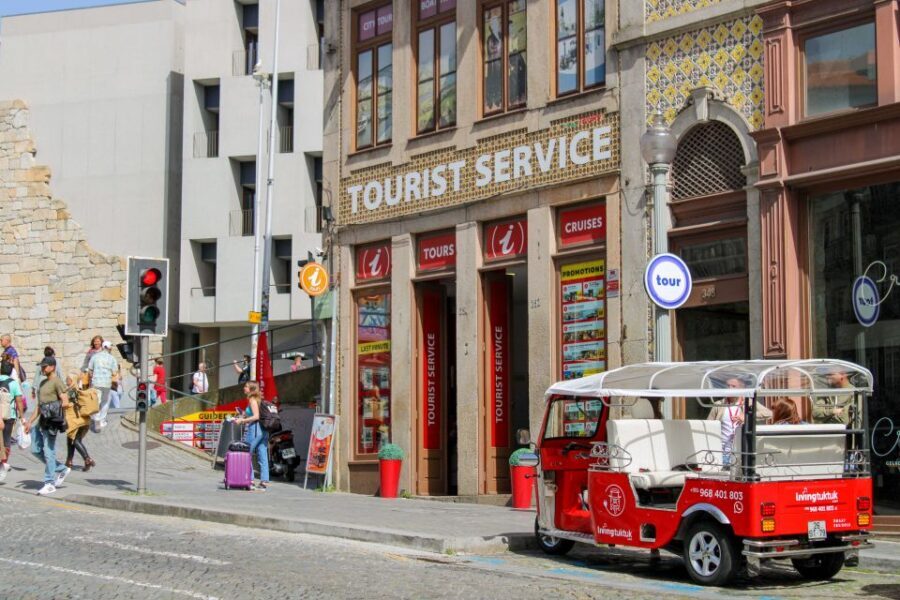 Porto: Tuk-Tuk Tour, Douro River Cruise, and Wine Tasting - Largo Actor Dias and the electric tuk-tuk streets of Porto