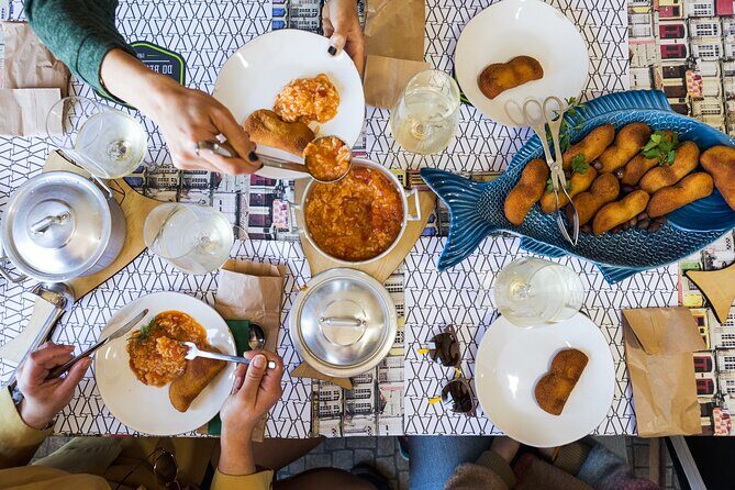 Porto Wine & Dine: Port Wine Cave Food Tour with Eating Europe - Rua Cândido dos Reis: bacalhau and a short detour into local food culture