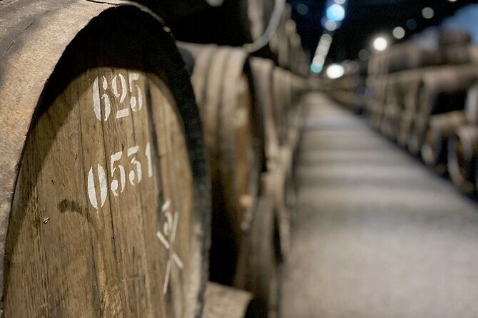 Wine Tasting with Tapas Walking Tour in Porto - Ribeira do Porto walk: cobblestones, viewpoints, and wine culture stories