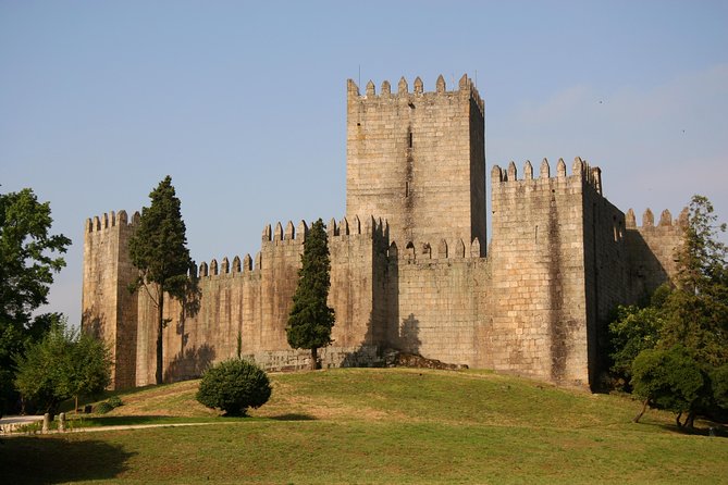 Braga and Guimarães Full Day Private Tour from Porto - Oliveira Square and the church stop that sets the tone