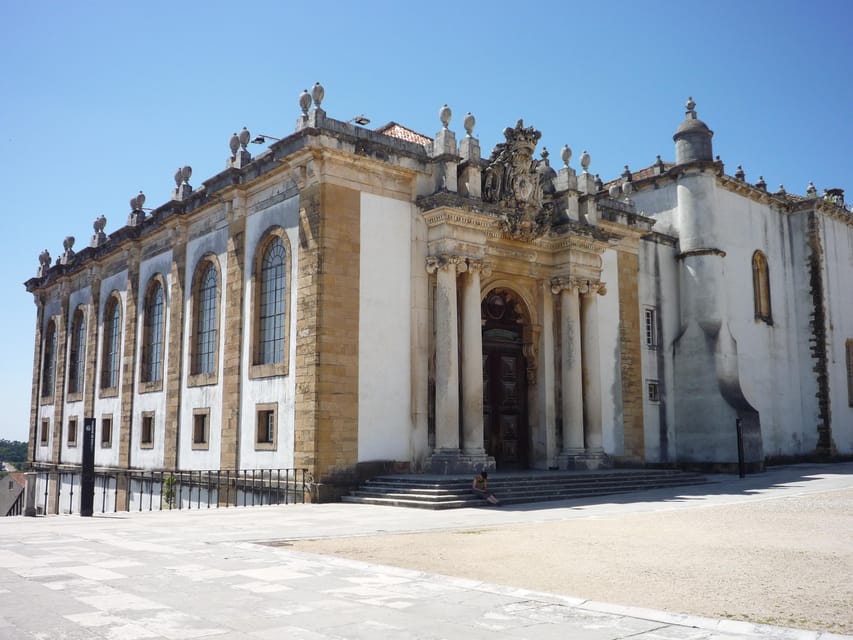 From Porto: Full-Day Trip to Coimbra & Aveiro with Boat Ride - Coimbra’s medieval gates and the cathedral pair