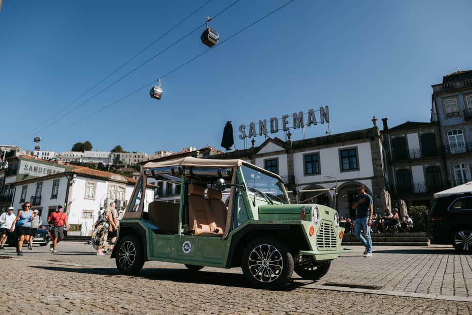 Porto and Foz: Private Douro City Tour in an Electric Ford T - Passing Palacio da Bolsa and Alfândega: what you see when you know what to look for