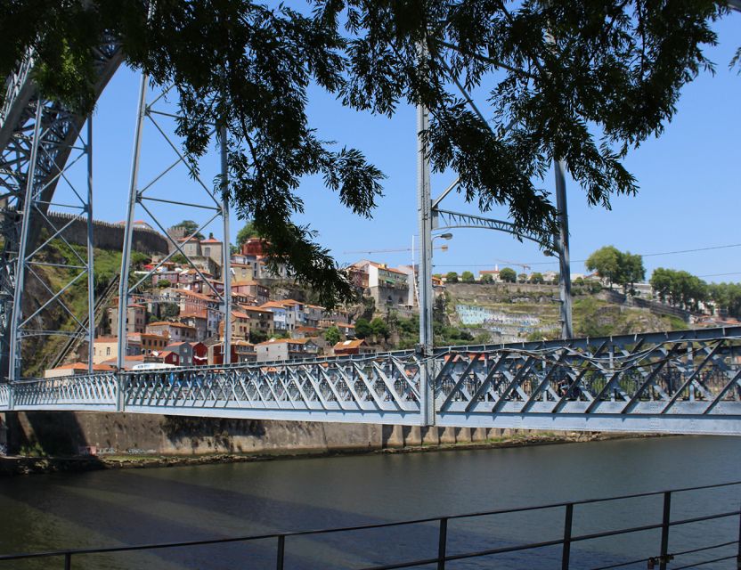 Porto: Wine Tasting with Tapas Walking Tour - Guided walk through old Porto and Ribeira: cobbles, stories, and viewpoints