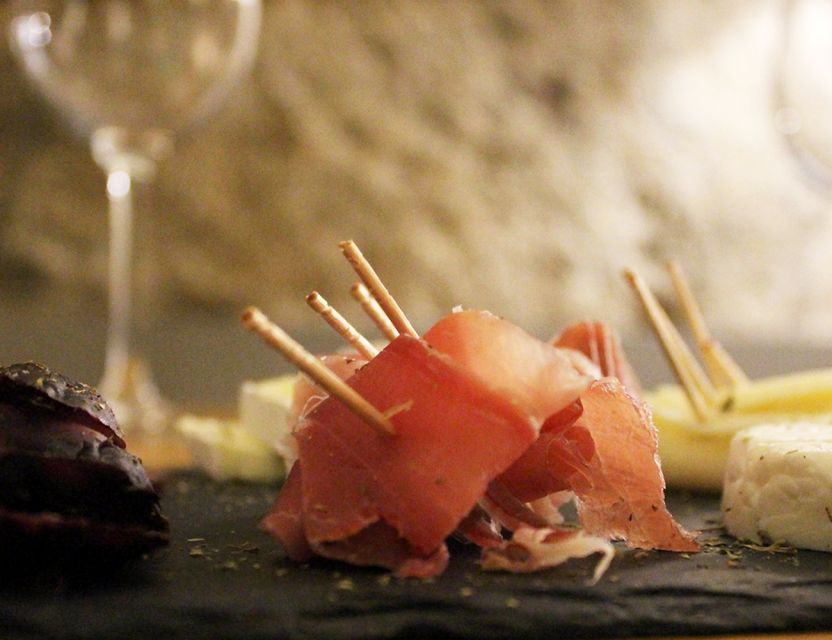 Porto: Wine Tasting with Tapas Walking Tour - Portuguese tapas and the wine pairing hour: Vinho Verde, Douro wines, and codfish cakes