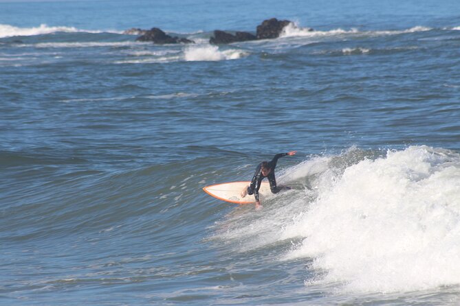 Surfing Lesson | Porto: Small Group Surf Lesson with Transportation - Wetsuit sizing: height and weight isn’t optional